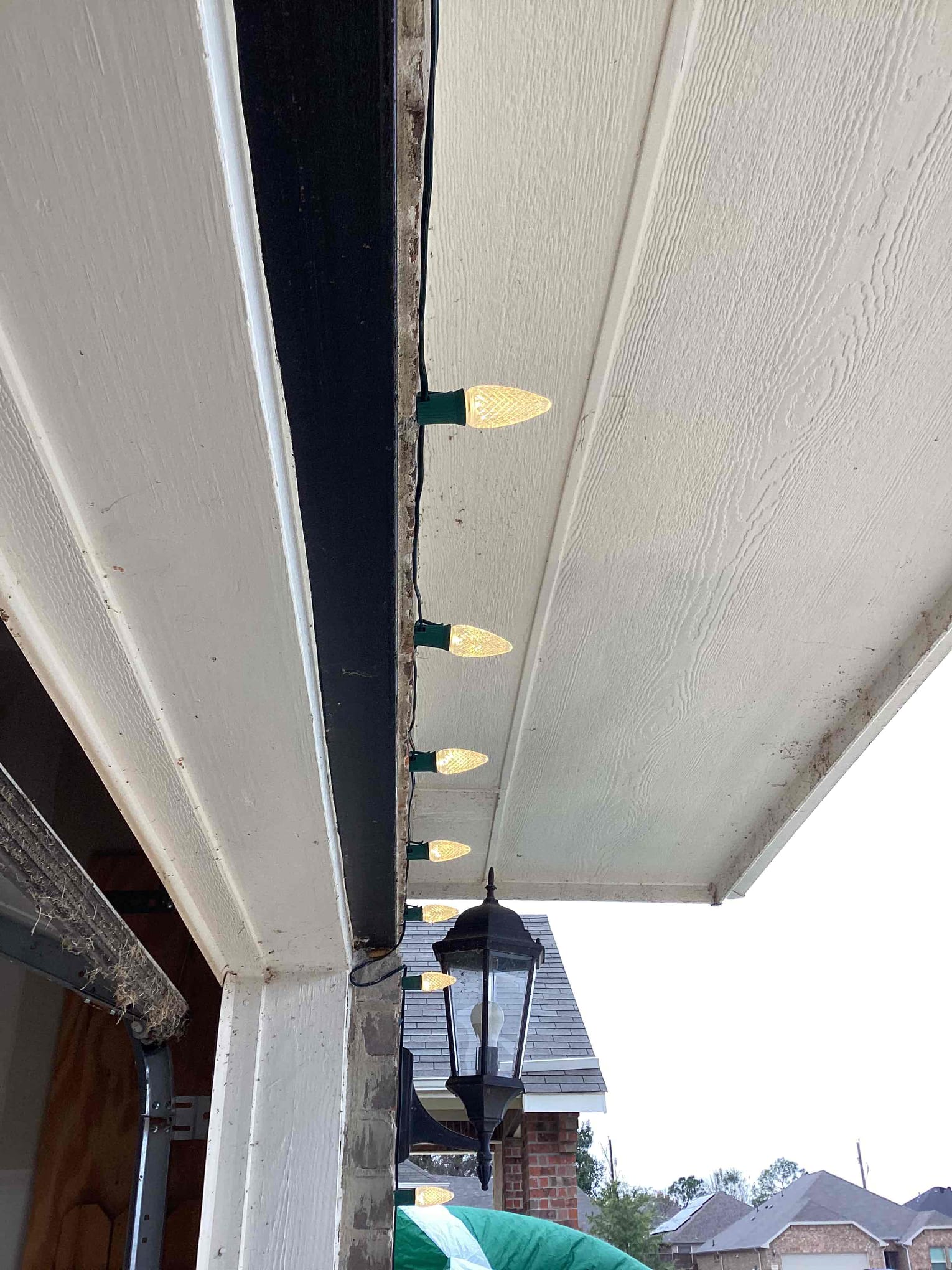 Arrived to look at issue with the garage circuit after we had already worked on it the line had lost power. Remade the connection in the back of the box and found that the gfci that we had installed had faulted out as when in a certain position or movement the power to the load side terminal would cease. Replaced the fault device and operated the Christmas lights and garage door to verify the issue resolved.