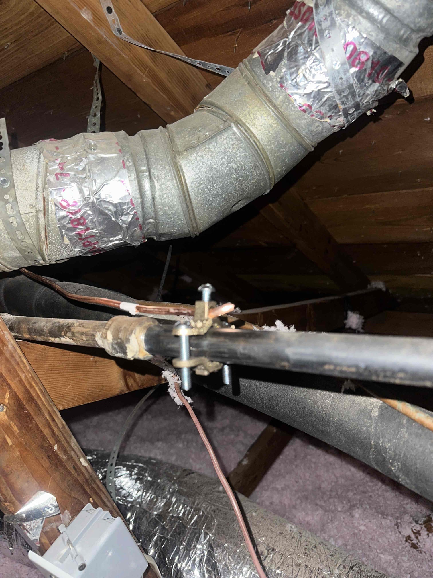 Separating neutrals and grounds in panel box, replacing single pole breaker in panel, adding bell box outside for expose wire in backyard, adding the harness for smoke detectors in home

Separated double lugged grounds and jet rail inside panel and replaced improper breaker in panel.  Cut existing wire exposed outside and installed into box for proper protection, and ran ground from panel through attic to gas pipe on attic furnace. 