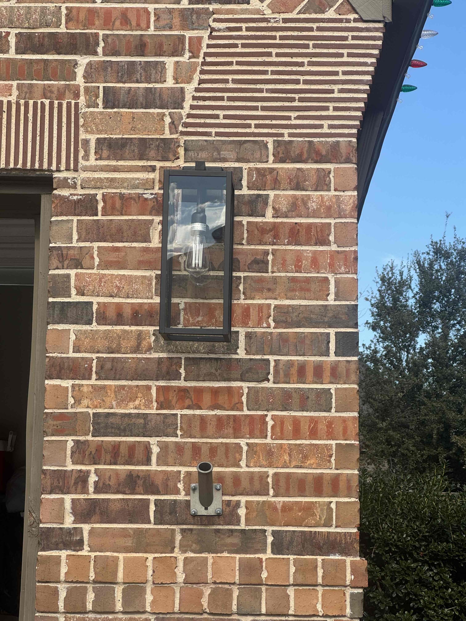 Returned for potential warranty after the circuit tripped again. But through investigation I found that the uplights are operational however the middle switch that controls the porch light and sconce lights trips the circuit when activated. Customer is going to get new fixtures and installers will return tomorrow to install.