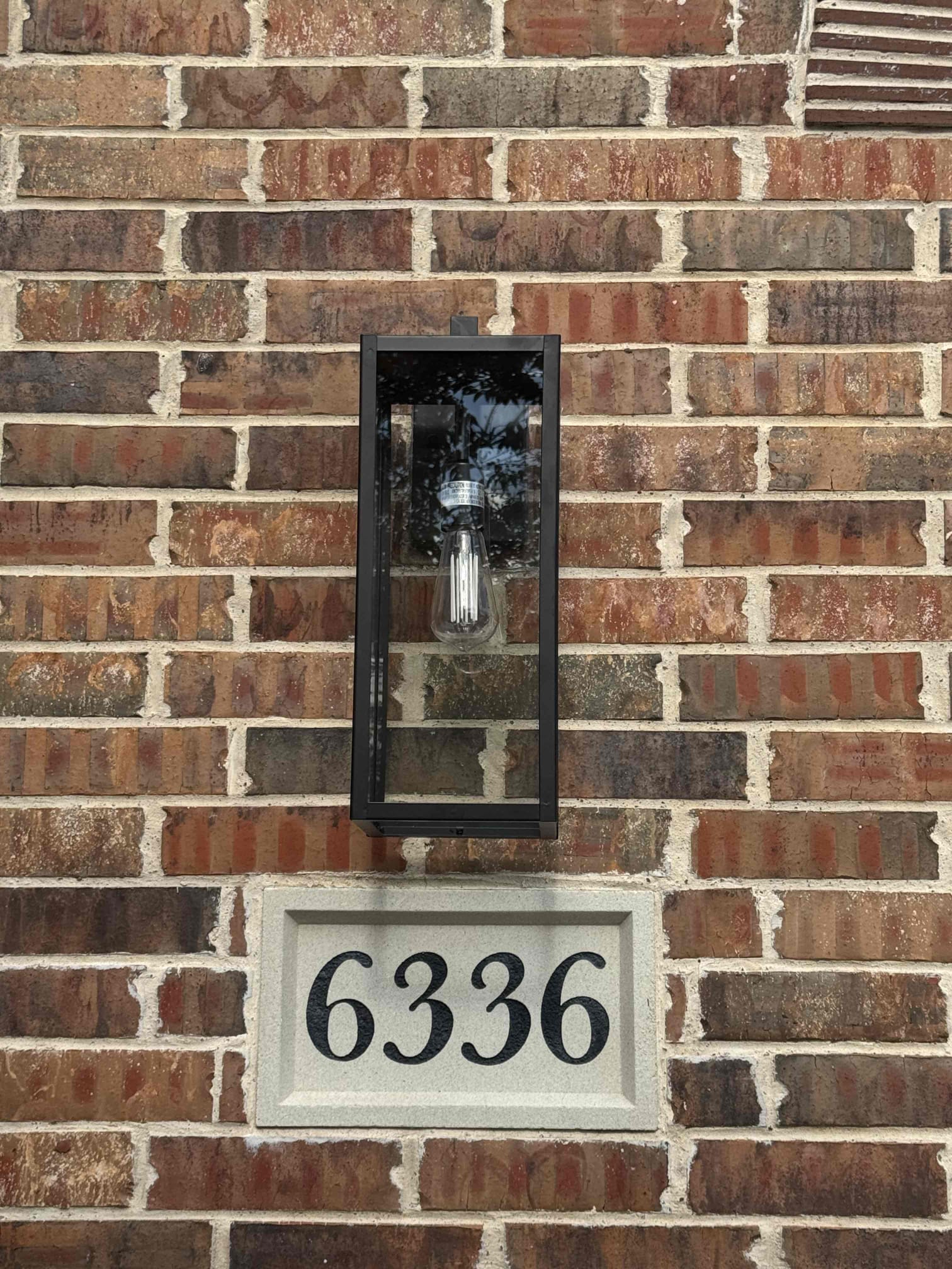 Returned for potential warranty after the circuit tripped again. But through investigation I found that the uplights are operational however the middle switch that controls the porch light and sconce lights trips the circuit when activated. Customer is going to get new fixtures and installers will return tomorrow to install.