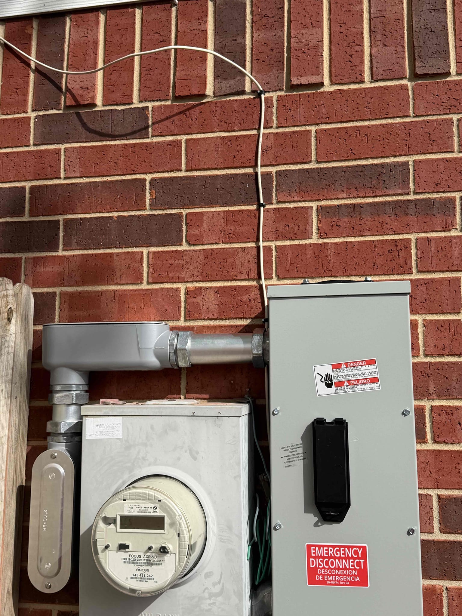 Arrived on the job site. Customer stated that the circuit controlling the living room was not working properly, intermittently losing power, and his plug tester was showing a “hot-to-ground reverse” reading. Prior to my arrival, the customer had checked several outlets himself, except for two on the same circuit. I inspected the two outlets he had not checked and found that one of them had a bad connection. I replaced the outlet, which powers the ADT security system, and informed the customer that it carries a five-year warranty.

I also notified the customer that I would be performing a full safety evaluation. Upon opening the panel, I found that the bar connecting the main breaker to the bus bar was severely damaged, showing heat damage and discoloration. I explained to the customer that this is not safe and that, given the age of the home (built in the 2000s), the electrical panel is within the typical 20–25 year replacement range. The panel also had multiple tandem breakers install