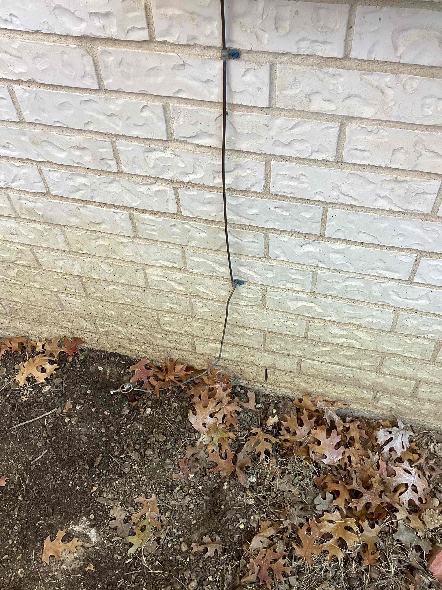 Arrived to look at issue with the ground rod not being in the ground after the plumbing trenches were cut and backfilled. Found that the initial rod was only 2 feet long so installed 8 foot rod to replace.