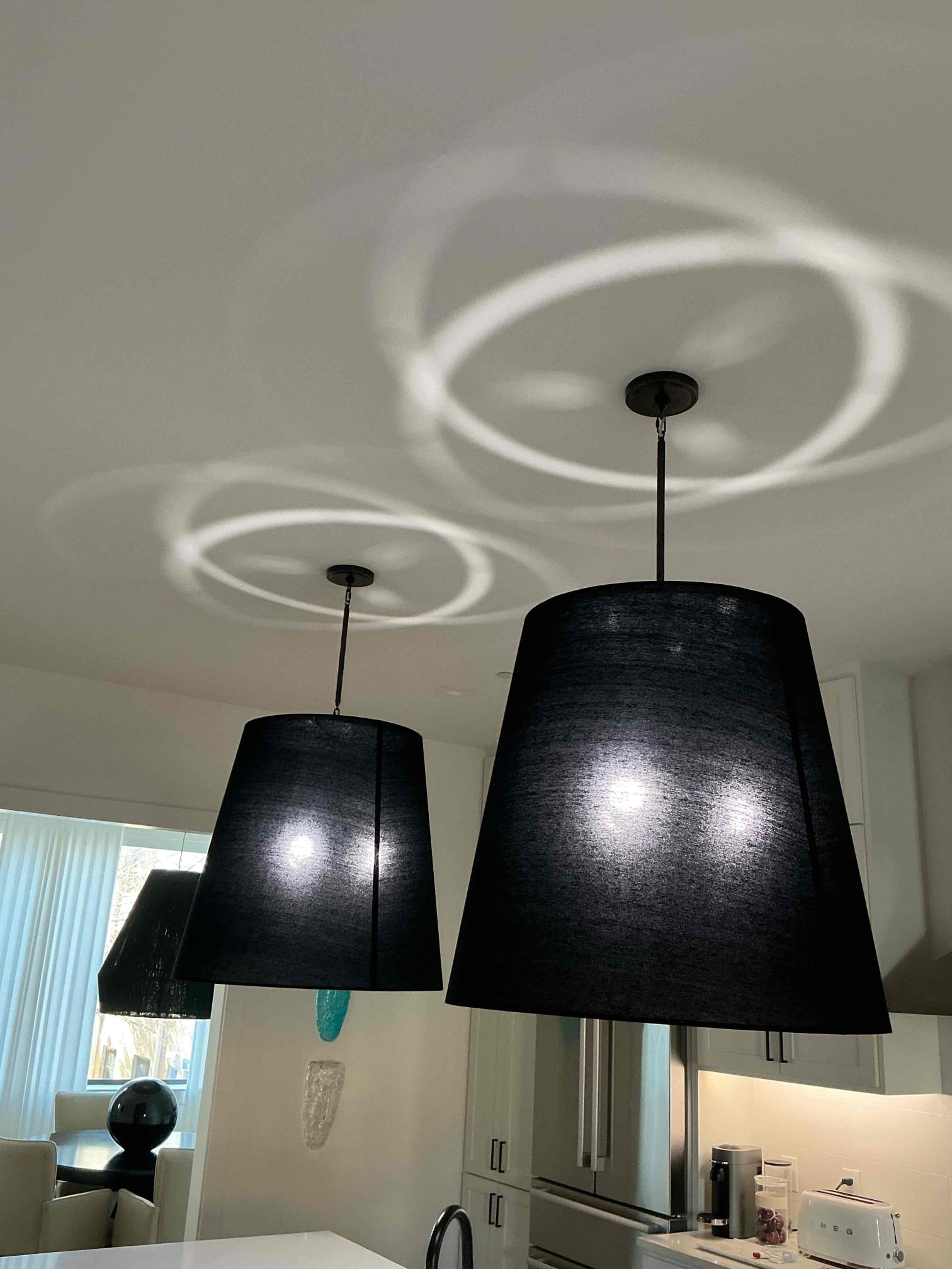 1. Take down fixtures in kitchen and take apart and hang back up in the kitchen above island. Customer is happy with the fixtures and likes the color for the light fixture. If we have to come back out and change or adjust, we will charge. Everything is working with no issues.