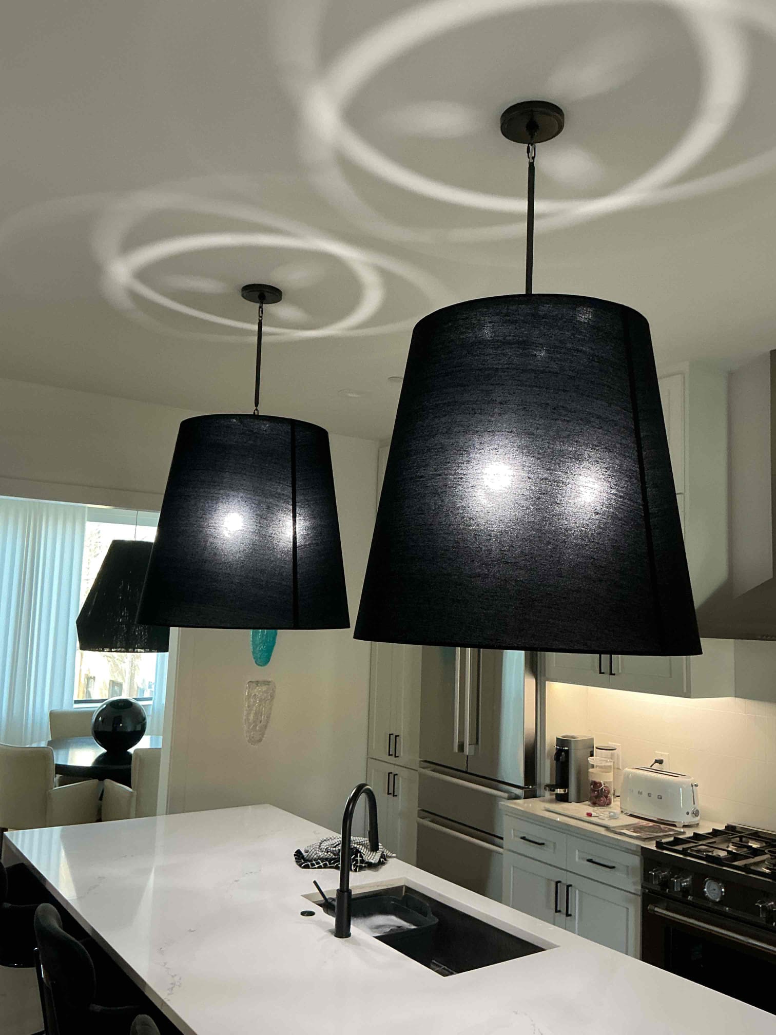 1. Take down fixtures in kitchen and take apart and hang back up in the kitchen above island. Customer is happy with the fixtures and likes the color for the light fixture. If we have to come back out and change or adjust, we will charge. Everything is working with no issues.