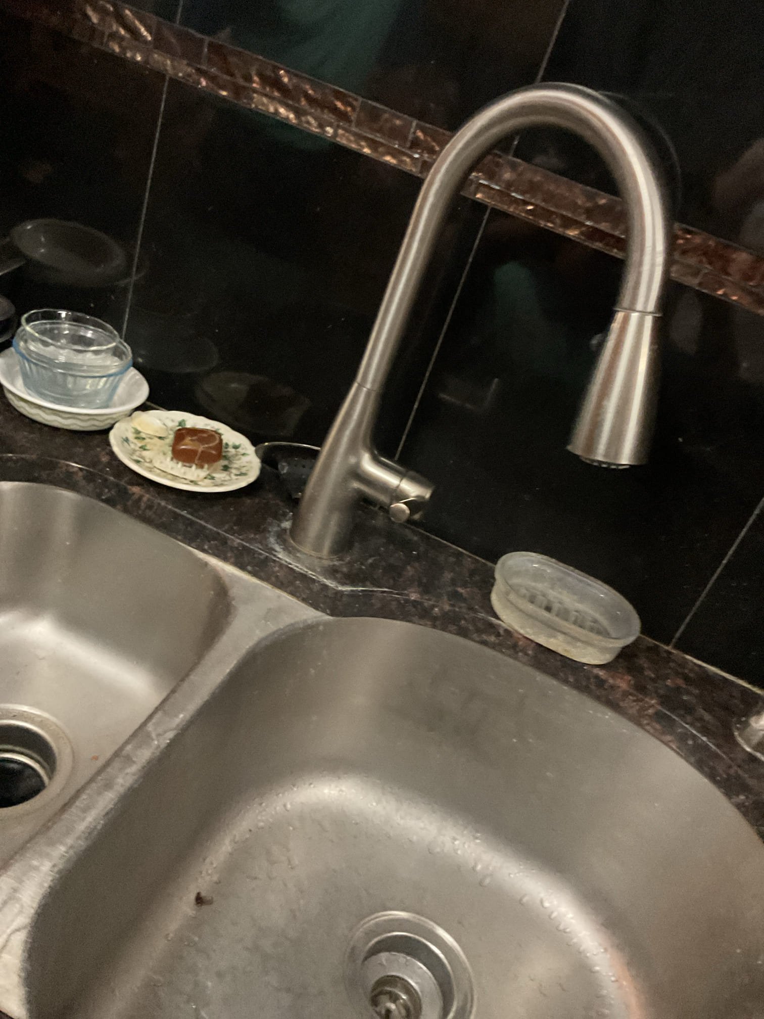 Upon arrival customer directed me to the kitchen sink. The sink was backed up. Ran drain cable and restored flow. Had significant resistance while running cable. Recommended camera inspection. No warranty on drain clear. Ran water to check for leaks on tubular drainage under sink. Customer paid with $100 bill. 