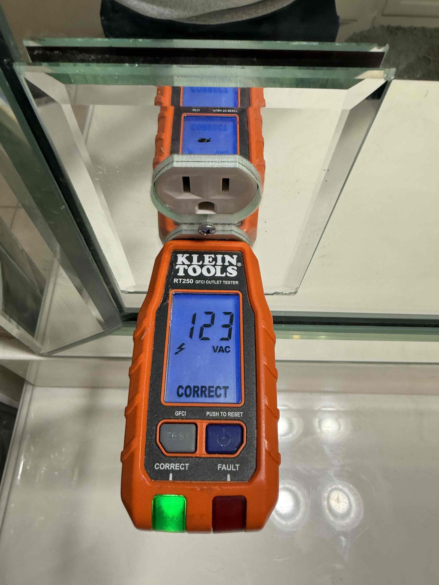 Customer had a burnt plug in the bathroom most likely caused from items heating up. Found the GFCI located in the master bathroom closet on the back wall on the shoe shelf. Tripped and tested and everything worked with no issues and the plug was to the left of the switch above the countertop with no sink. Tested and everything works with no issues and five year warranty unplugged unless customer keeps using heating Appliances.