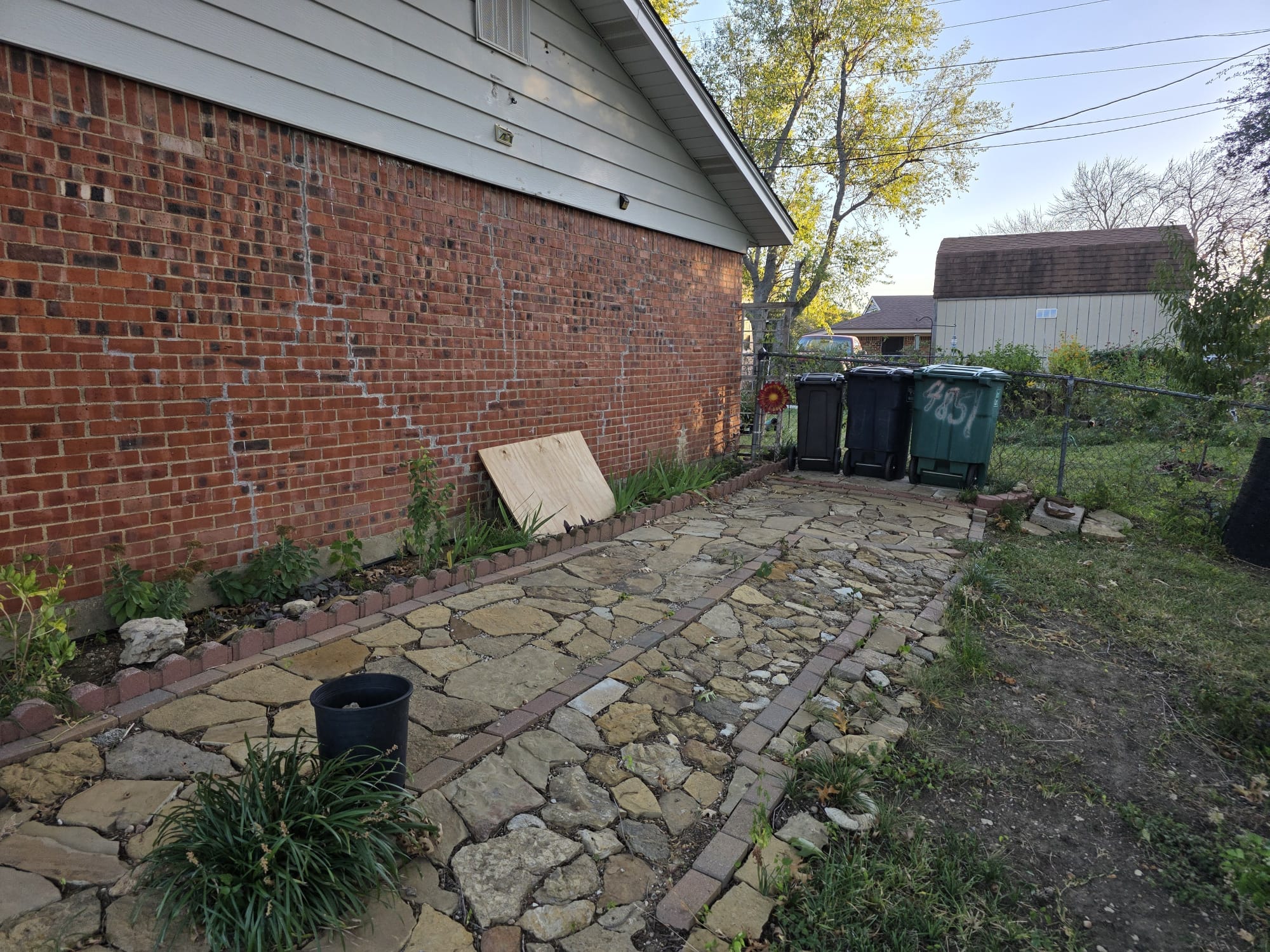 Excavate tunnel from the exterior of the home to the break in the cast iron kitchen line
Cut out and replumb the kitchen and laundry drains under the slab up to that point connecting on to the rest of the line
Properly secure the pipe to the underside of the slab
Have new pipes inspected by the city inspector 
Backfill and compact
Hydrojet main sewer line to remove roots
Repair water line inside wall behind laundry replacing shark bite fittings with proper copper fittings
Under kitchen sink, cut back galvanized nipple, transition to pvc and re pipe the tubular waste with a continuous waste tee and new p trap
Replace laundry hot and cold valves
15 year parts and labor warranty on pipe installed