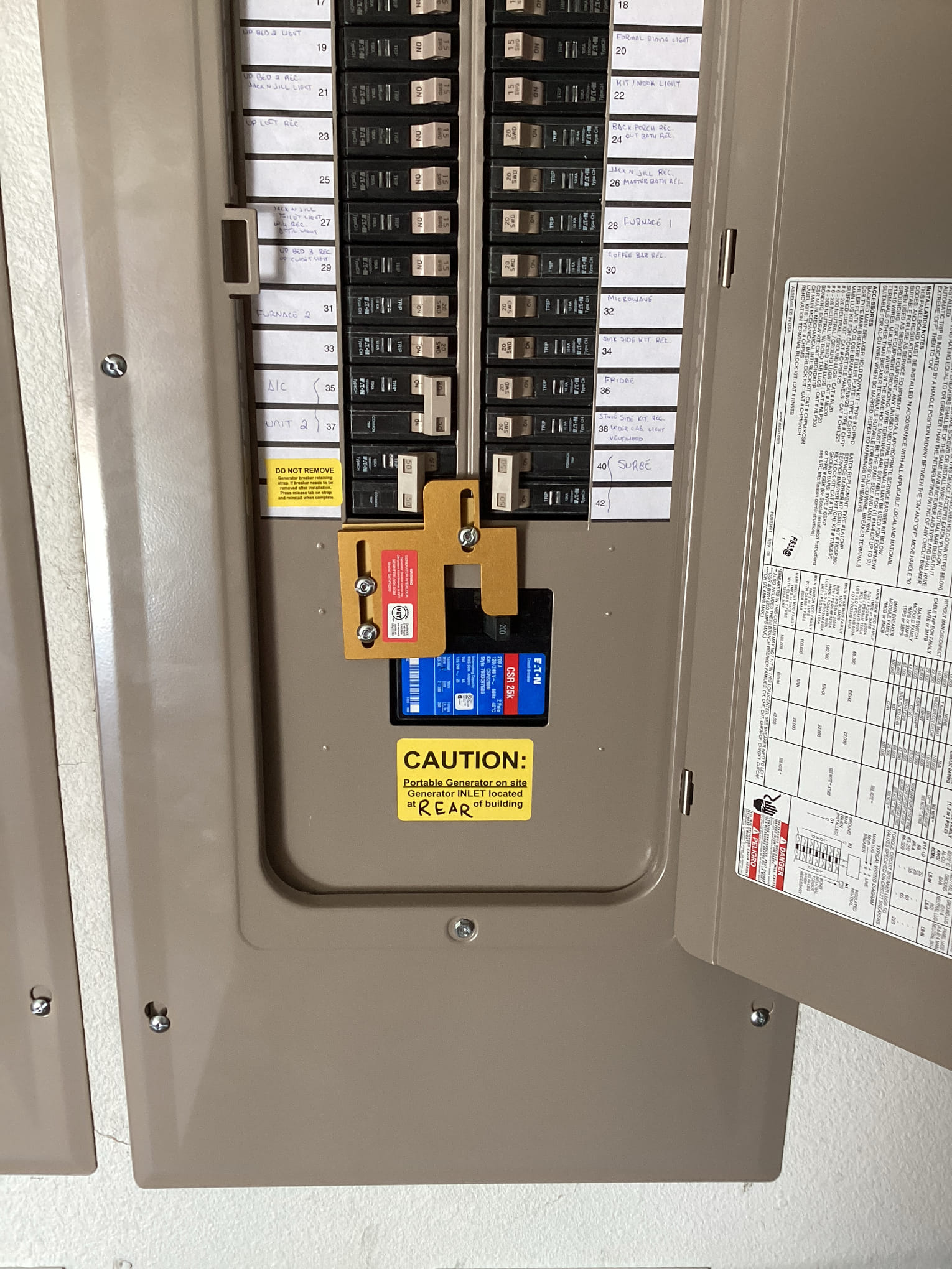 Arrived with the interlock kit and installed the kit on the panel deadfront as well as landed the wires on the breaker.