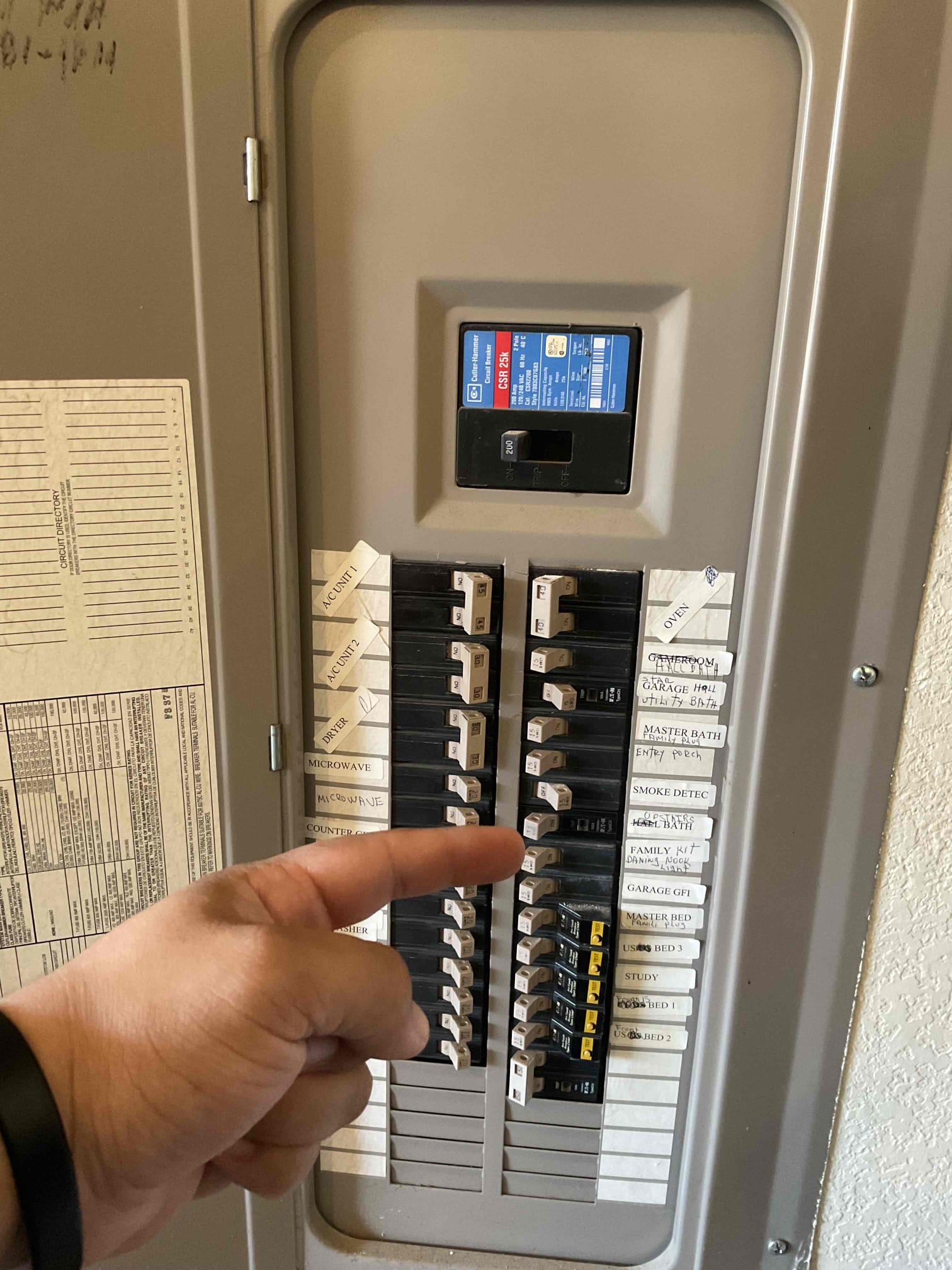 Arrived on job site; the customer stated that he was turning breakers on and off while attempting to replace a part in the upstairs bedroom ceiling fan. While identifying which breaker controlled the fan, one breaker failed to reset and would not turn back on, indicating a failed breaker. I informed the customer that, due to the age of the electrical panel, it is common for breakers to fail when tripped or reset, and this can potentially create a domino effect with other breakers. I explained that the long-term solutions would be either replacing the affected breakers or replacing the panel.

The customer requested options for breaker replacement as well as smoke detector replacement. For now, I replaced the failed breaker using a customer-supplied breaker, and all affected circuits are operating properly. One breaker shown turned off in the panel photos remains off because the customer is still working on the ceiling fan.

I advised the customer that estimates for breaker replacement 