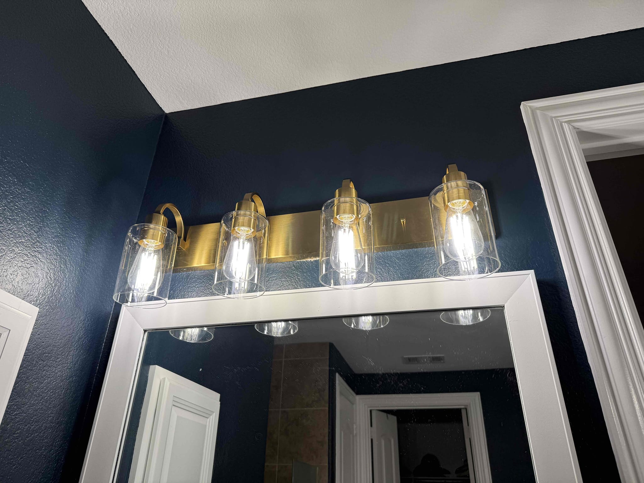 Arrived on the job site, and the customer requested replacement of both master bathroom vanity light fixtures. Both fixtures were successfully replaced. The customer received a five-year warranty covering the installation and all electrical connections. The customer was 100% happy and satisfied with today’s visit.