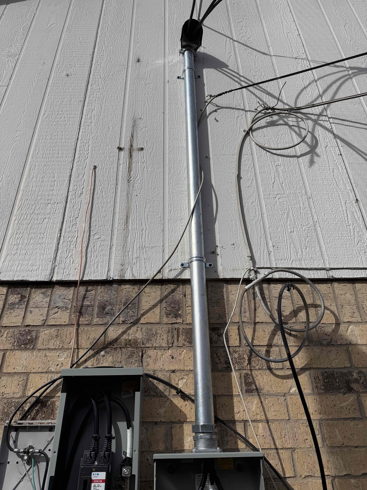 Customer called about a power issue with the 240 volt circuits in the home. Found breakers are burning up in the panel causing issues throughout the home. Left options for panel replacement 

Replaced 200 amp panel in garage and properly grounded home with ground rod and cold water bond.  Replaced 200 amp overhead service and installed whole home surge protection on panel.  Installed customer supplied battery smokes and carbon. 