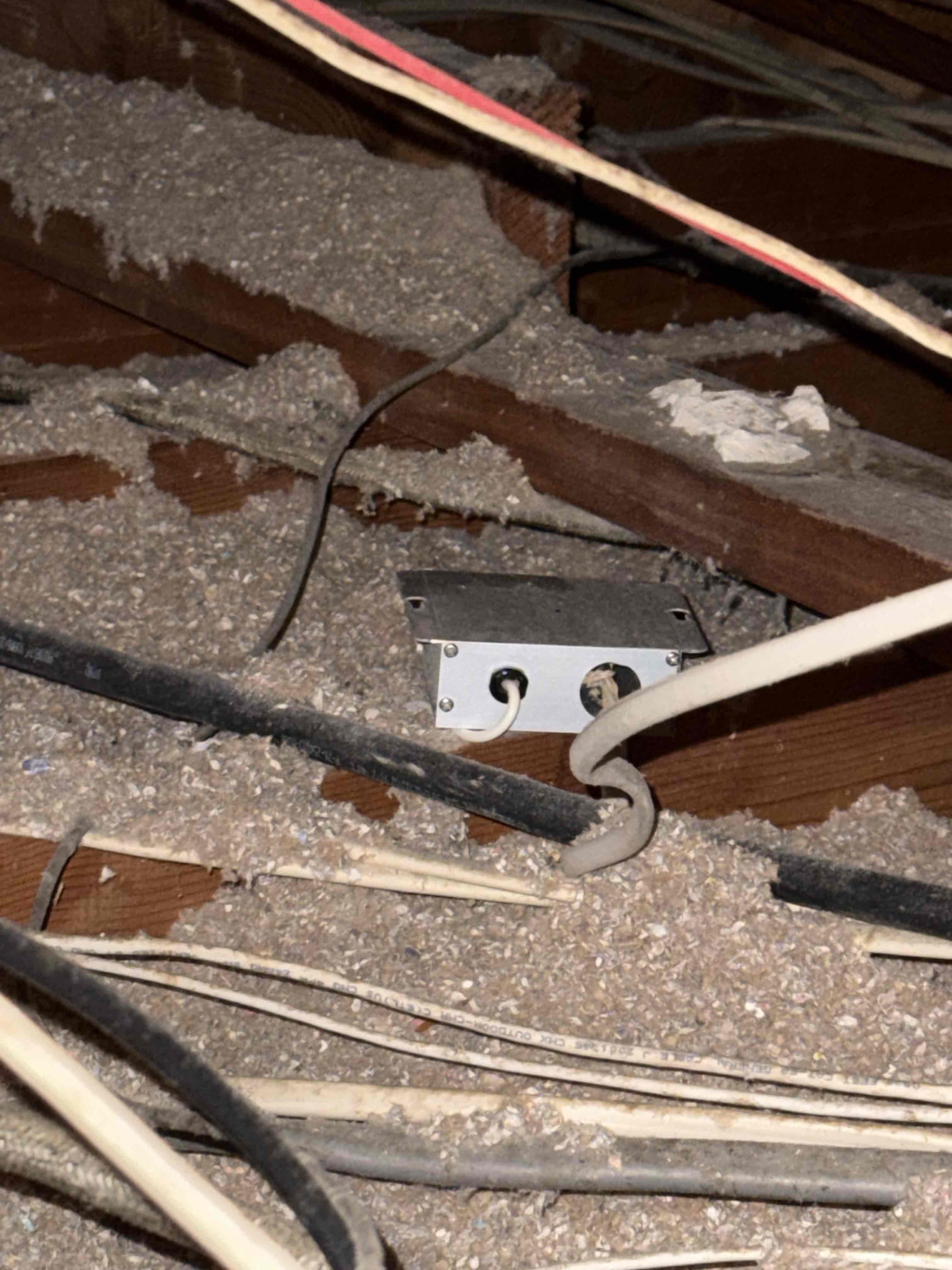 Arrived on site and performed a whole-home electrical safety inspection, walking the property and inspecting the entire electrical system. Upon opening the main electrical panel, it was observed that the home is equipped with a 100-amp main breaker panel, which is undersized and should be upgraded to 200 amps. The panel currently contains five 240-volt two-pole breakers, is fully maxed out with single-pole breakers, and has no capacity for additional circuits.

Multiple code violations were identified within the panel, including an oversized AC breaker and feeder conductors that appear to be connected using a Polaris tap that may not be service-rated. A bare copper conductor is being used as a neutral, which should instead be properly sheathed and identified with white insulation or white tape, creating a safety concern. It was also noted that multiple neutrals and grounds are terminated under the same lug on the neutral bar, which is not permitted and must be corrected.

No ground rod