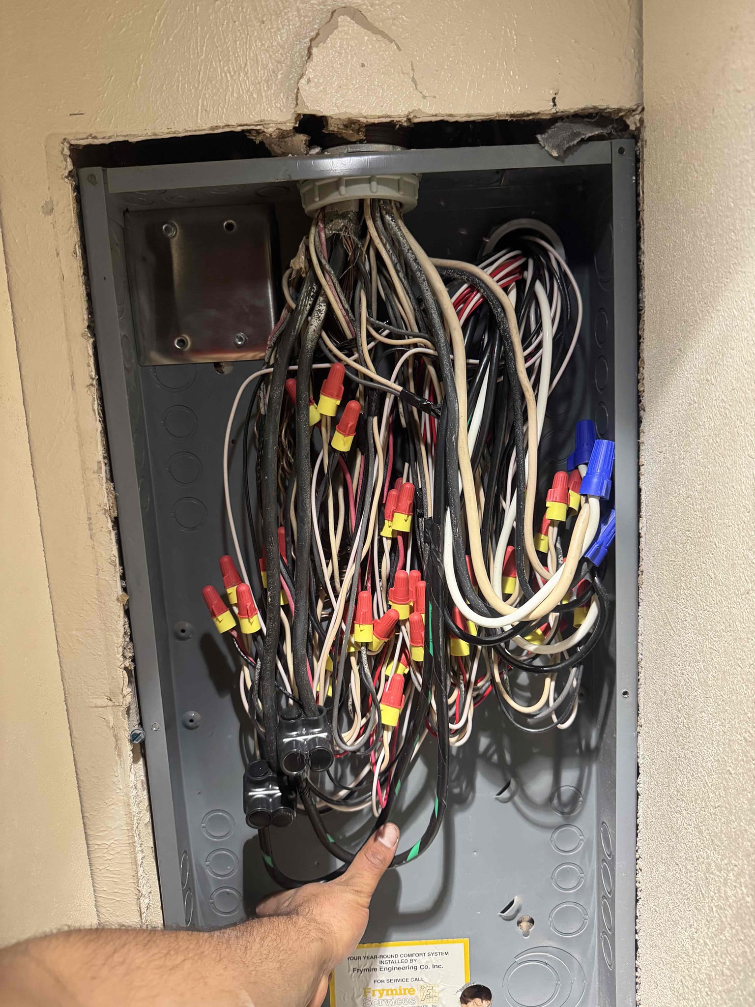 Arrived on site and the customer stated that the hallway smoke detector was overheating and producing a strong burning odor. Replaced the existing unit with a new hardwired BRK smoke detector featuring a sealed 10-year battery and a 10-year manufacturer warranty.

Performed a full home safety evaluation and observed that the electrical panel was located inside a closet, outdated, and not up to current code. Provided a solution to relocate and replace the panel to an exterior location and bring the entire electrical system up to current city code requirements to pass permit inspection.

Scheduled to return on Thursday to complete the work, which includes relocating the main breaker panel to the exterior, extending existing conductors, installing AFCI protection for bedroom circuits, adding whole-home surge protection, replacing the meter base with a slip riser, installing a complete grounding system (ground rod and cold-water bond), upgrading unprotected wet locations with GFCI protecti