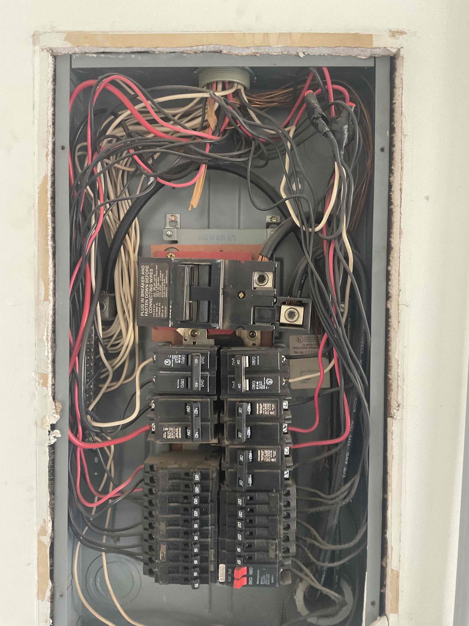 Arrived on job site at the customer’s request to perform a whole-home safety inspection. After inspecting the entire home, it was determined that the existing Challenger breaker panel located in the garage is hazardous and shows significant signs of heat damage. During the inspection, it was also observed that the kitchen GFCI repeatedly trips and produces an arc when reset, indicating a fault within the circuit.

The customer expressed interest in installing an electric vehicle charger. I advised that installing a car charger on the existing panel is not recommended due to safety concerns and that the panel will need to be replaced. The customer understands the hazards associated with the recalled Challenger panel and the importance of replacing it. All proposed solutions will bring the electrical system up to current City of Carrollton code requirements and ensure it passes city inspection.

A follow-up in-person visit is scheduled for February 11th, after the customer closes, to rev