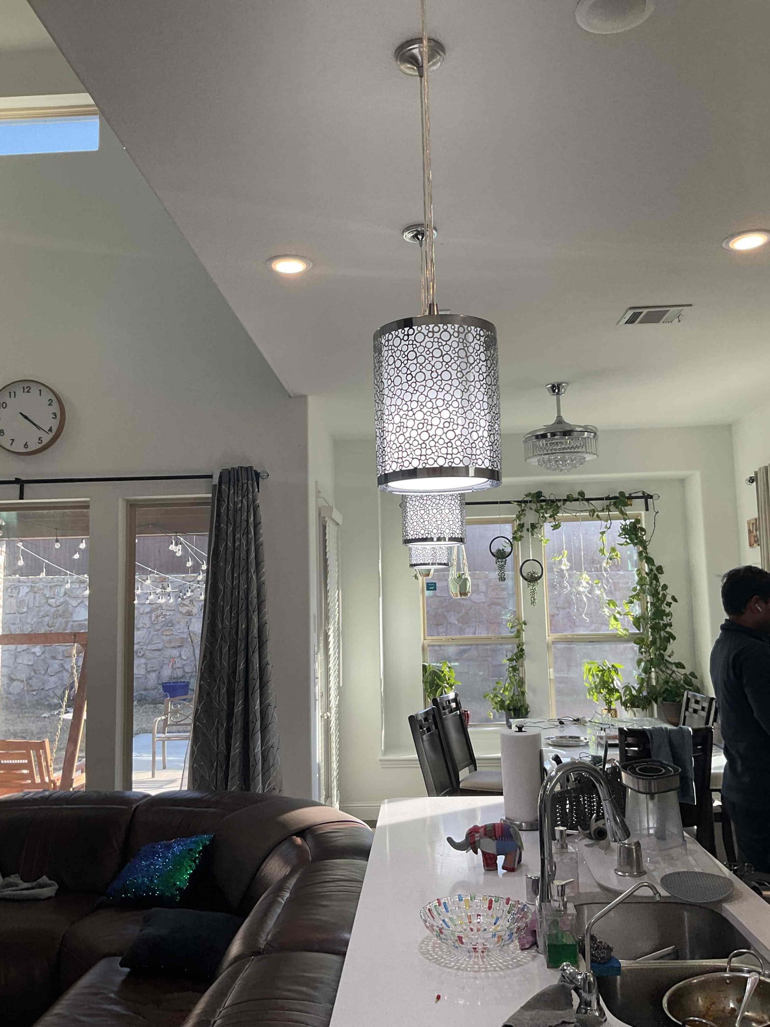 Customer called about a possible warranty on work we completed 10 months ago. Customer stated that there were lights flickering for the last few months. Lights are only the 3 kitchen island pendant lights. Lights were not flickering while I was on site. Toggling the switch on and off can cause the bulbs to pulse in unison. Issue is most likely the smart bulbs currently being used. Recommended replacing the bulbs