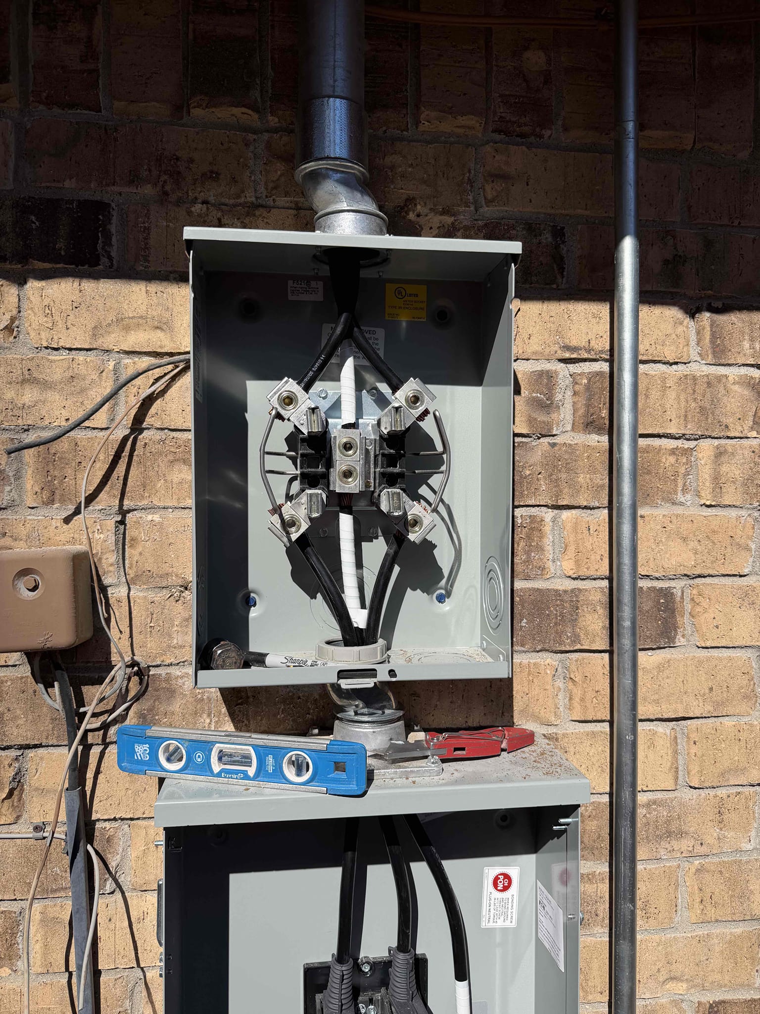 1. Pull all city permits and inspection 
2. Install overhead main electric service and meter base (lifetime warranty)
3. Install weatherproof first responders disconnect (lifetime warranty)
4. Install indoor 200 amp main breaker panel (lifetime warranty)
5. Install generator interlock kit on existing circuit 
6. Install grounding system 
7. Install whole home surge protector - 108k amps protection (lifetime warranty)
8. Run surface mounted circuits in garage into wall (free)
9. Install GFCI protection for all required circuits and locations including EV charging station
10. Install 110 volt hardwired and interconnected smoke detectors in bedrooms and hallways

*220 charge from Oncor
*10% discount with VIP for 1 year (electric and plumbing)

Replaced 200 amp panel in garage and properly grounded home with ground rod and cold water bond. Replaced overhead 200 amp service and installed 200 amp emergency disconnect installed whole home surge protection on panel and installed hardwired smok