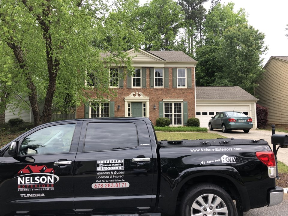 HardiePlank siding, new gutters and downspouts, and a Sherwin-Williams resilience paint job HardiePlank siding, new gutters and downspouts, and a Sherwin-Williams resilience paint job