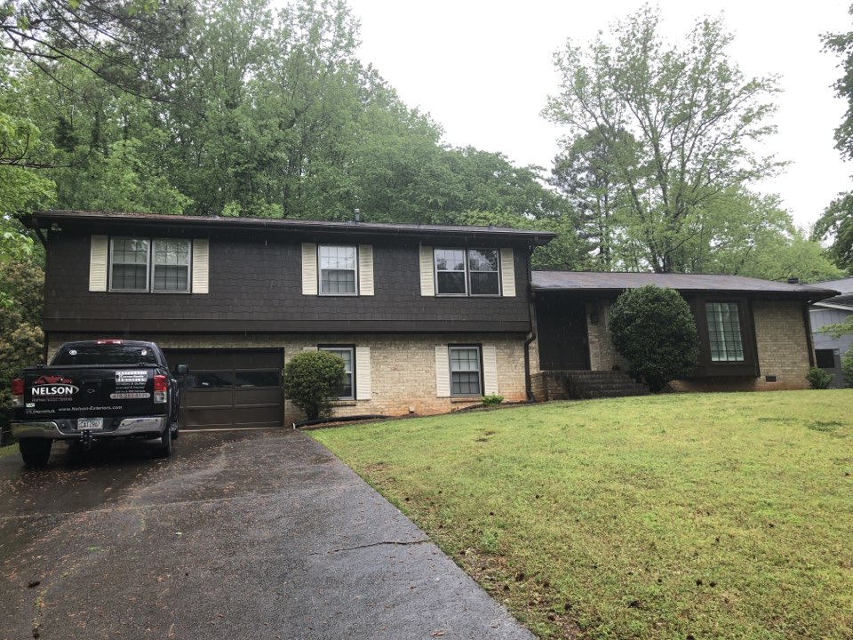 HardiePlank siding, HardieTrim soffit and facia, and a Sherwin-Williams resilience paint job HardiePlank siding, HardieTrim soffit and facia, and a Sherwin-Williams resilience paint job