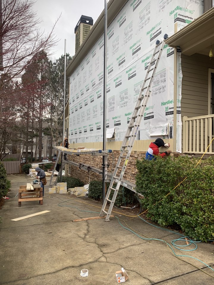 Installing Hardie siding. Installing Hardie siding.