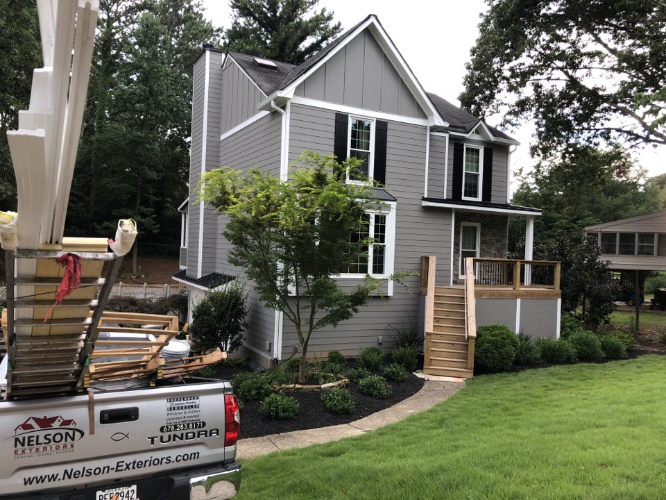 Checking out a siding, painting, deck, window, and metal roofing job for final punch list. Looks good! Checking out a siding, painting, deck, window, and metal roofing job for final punch list. Looks good!