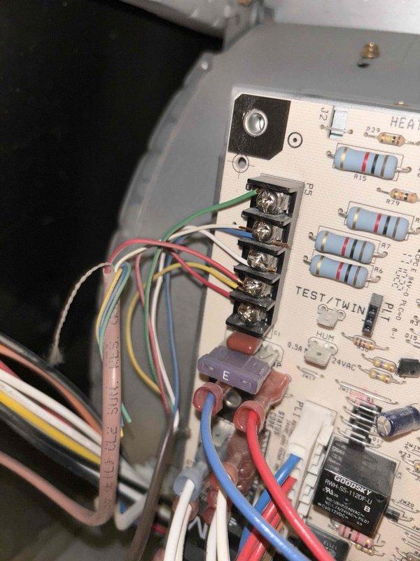Diagnosed 9-year-old HVAC system with complete compressor capacitor failure and weak fan capacitor. Upon replacement of capacitor, discovered refrigerant leak at heavily rusted indoor coil preventing system operation. Compressor and fan motor running amps within acceptable range, but starting amps exceed manufacturer specifications. Additionally noted furnace heat exchanger displaying overheating marks and rust along seams; while unit remains suitable for AC operation, furnace maintenance recommended to ensure safe heating function. System requires indoor coil replacement; will verify warranty coverage and part availability before proceeding with repairs.
