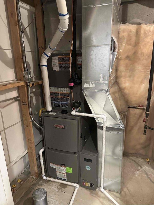 Completed full HVAC system replacement including installation of Lennox ML196UH045XE36BK 96% efficiency furnace, ML13KC1-024 air conditioner, and CK40CT-30/36B-71 evaporator coil. Installed new 16x25x5 filter cabinet with MERV 11 filter, pressure switch, and AC pad; flushed and reused existing lineset; ran PVC condensate drain to floor drain; retained existing thermostat. System tested, operational, and ready for service.