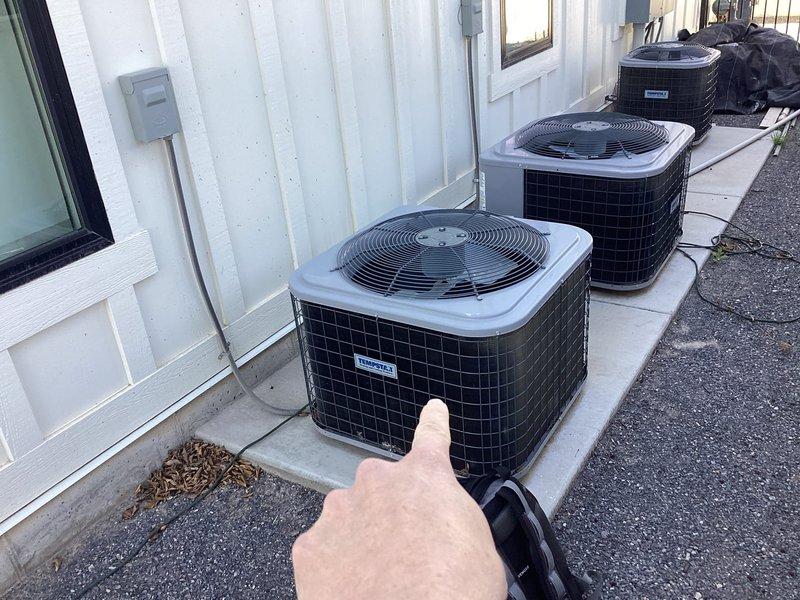 Responded to tech lead for estimate on one of three air conditioning systems reported as completely flat on refrigerant. Evaluated 6-7 year old condenser unit located at northeast corner of property, confirmed system has lost all refrigerant charge and requires repair or replacement. Presented full system replacement options with emphasis on affected AC unit, discussed equipment options and provided preliminary pricing for customer consideration.