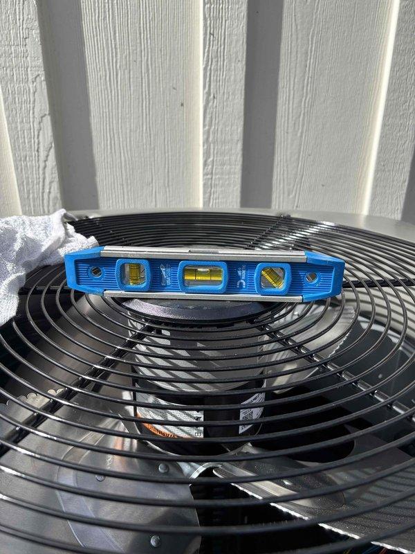 Completed full air conditioning system installation including Lennox EL18KCV-036 condensing unit and CK40CT-36B-71 evaporator coil. Installed RDS communicating board 27A03 to enable system communication and integrated new Ecobee thermostat to replace existing Nest unit. Flushed and reused existing lineset, installed 16x25x5 MERV 11 filter, and completed all necessary sheet metal modifications. Positioned condensing unit on existing concrete pad, installed FLNR 35 amp fuses in outdoor disconnect box, and verified level installation of all equipment. Protected work areas with drop cloths throughout installation, completed electrical connections, charged system to manufacturer specifications, and tested all components for proper operation and communication.