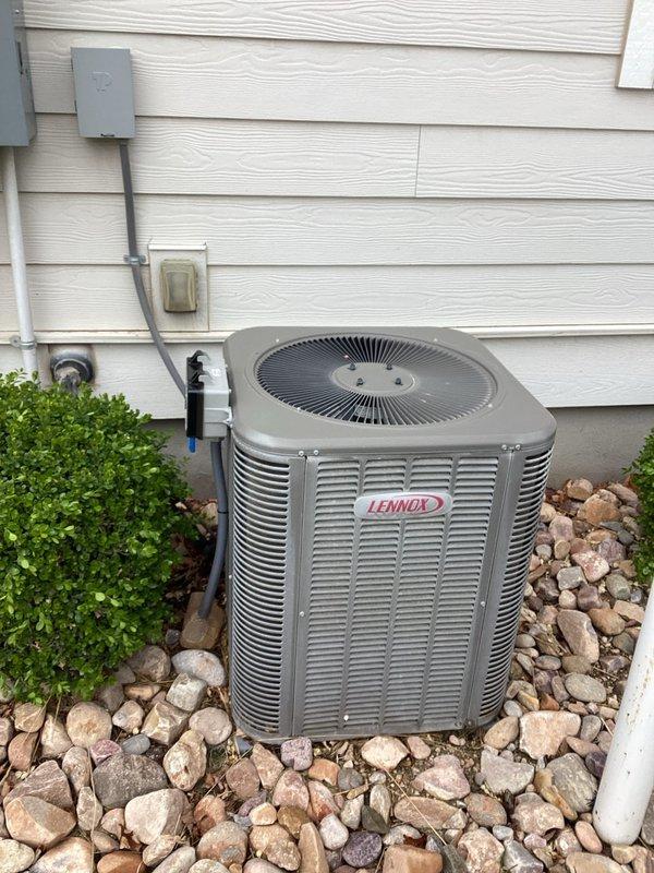 Responded to no cooling complaint on 8-year-old Lennox air conditioning system. Upon inspection, identified failing capacitor affecting system performance. Capacitor showed signs of wear and was determined to be at end of service life. Replaced defective capacitor with new component to restore proper compressor and fan motor operation. Tested system operation and confirmed adequate cooling restoration. Discussed preventative maintenance program benefits with property contact for future system reliability.