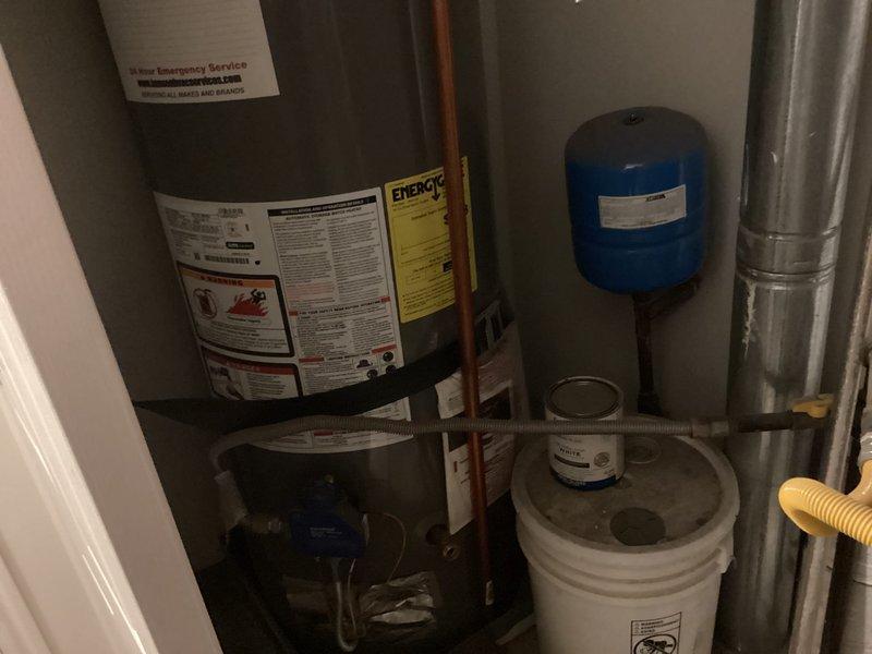 Responded to service call for air conditioning system blowing warm air in residential property with 5-year-old equipment. Inspected Payne furnace unit located in laundry room and outdoor condensing unit to diagnose cooling failure. Performed system evaluation including refrigerant levels, electrical connections, thermostat operation, and airflow assessment to identify root cause of heating mode operation during cooling demand.