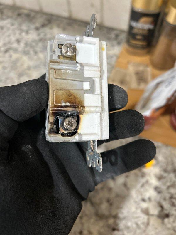 Responded to service call for multiple electrical issues affecting kitchen and garage areas. Diagnosed and repaired three non-functioning outlets in the kitchen, which showed evidence of thermal damage to receptacle components with visible burn marks and charring on terminal connections. Replaced damaged outlets and verified proper circuit function. Installed new 220-volt dedicated circuit in garage to provide power for sauna unit, including appropriate wiring, breaker installation, and code-compliant receptacle. All circuits tested and confirmed operational upon completion.
