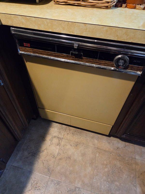 Responded to service call for multiple plumbing fixture issues throughout the residence. Inspected leaking bathtub faucet, bathroom sink faucet, and kitchen sink faucet to assess repair requirements. Evaluated toilet flush mechanism and identified internal tank components showing mineral buildup and age-related wear affecting proper flush operation. Examined bathtub handle alignment issue where fixture was not sitting flush against wall surface. Assessed existing garbage disposal unit for replacement needs. Inspected dishwasher installation area and associated drain and supply line connections in preparation for upcoming appliance replacement, verifying pipe conditions and confirming proper configuration for new unit installation.