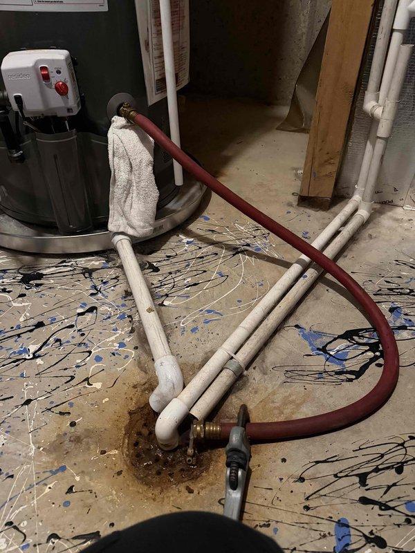 Completed annual plumbing membership inspection of residential property. Performed comprehensive evaluation of water heater system, including visual inspection of stainless steel tank unit and control panel operation. Inspected PVC drainage and supply piping throughout utility area, verifying proper connections, fittings, and system integrity. All plumbing components found to be functioning within normal parameters with no leaks or deficiencies identified at time of inspection.