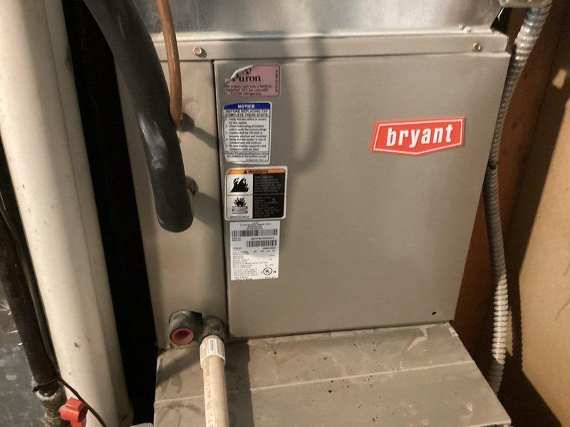 Responded to service call for inefficient AC operation on 25+ year old system with outdoor condenser unit and basement furnace installation. Performed comprehensive Cool 10+ preventive maintenance including inspection of Bryant HVAC equipment, verified system operation, and documented equipment condition with photographic evidence. System evaluated and serviced to restore proper cooling efficiency.