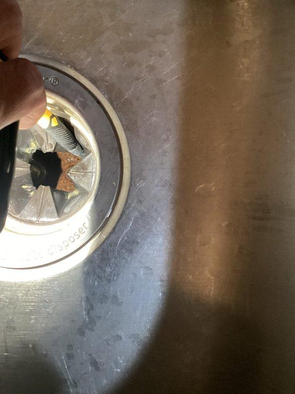 Completed comprehensive plumbing membership inspection including full assessment of water heater, supply lines, and shut-off valves. Inspected tanked water heater located in basement, documented equipment age and condition, and examined all accessible plumbing fixtures including bathroom vanity connections, chrome shut-off valves, and flexible supply lines for proper operation and potential issues.