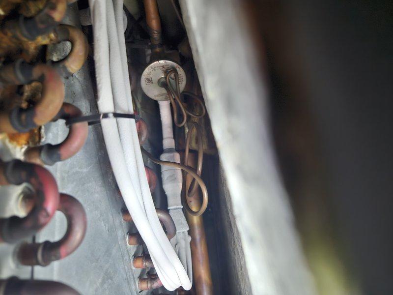 Responded to no cooling complaint on 11-year-old system. Performed Cool 10+ maintenance inspection on attic furnace and ground-level condenser. Measured supply air temperature at 73°F, inspected refrigerant lines and connections, checked all copper piping and insulated line sets for proper installation and condition. System evaluated for cooling performance issues and maintenance needs addressed per manufacturer specifications.