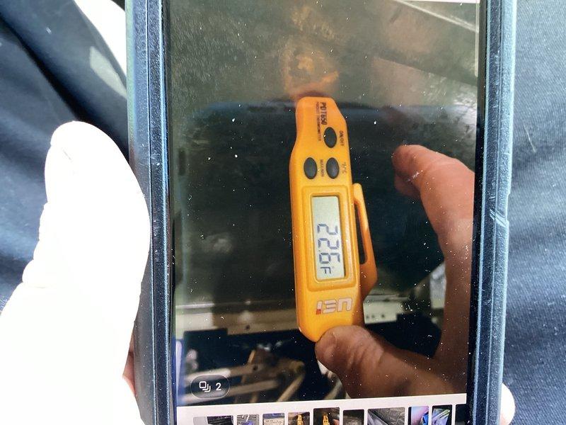 Responded to cooling efficiency concern on residential air conditioning system over 10 years old. Performed comprehensive system diagnostics using digital testing equipment to measure temperature differential and system pressures. Measurements indicated supply air temperature of 22.0°F at the register and system parameters showing 32.8 and 186.7 readings on refrigerant gauges, with additional diagnostics showing 9.9 and 96.7 values. Evaluated outdoor condensing unit in backyard and indoor air handler in downstairs storage room. Documented system performance with diagnostic readings to assess cooling capacity and overall system operation.