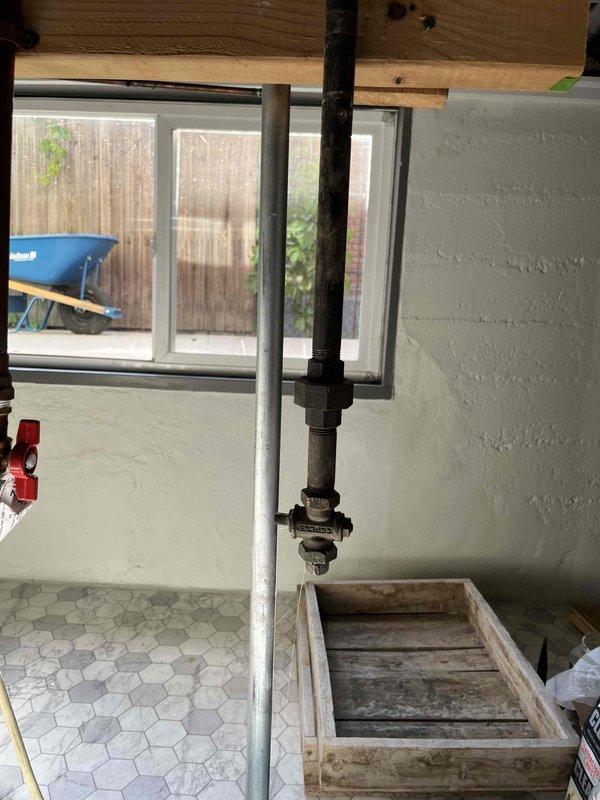 Completed membership plumbing inspection on 2-year-old tanked water heater in basement. Inspected water heater installation including pressure relief valve, supply and discharge piping, gas connections, and venting system. All components found to be in proper working order with no leaks or safety concerns identified.
