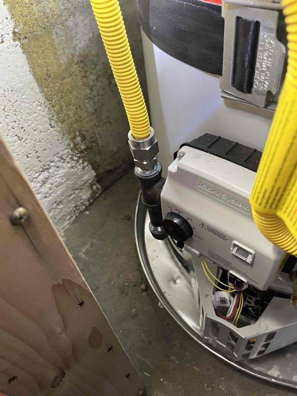 Completed membership plumbing inspection on 2-year-old tanked water heater in basement. Inspected water heater installation including pressure relief valve, supply and discharge piping, gas connections, and venting system. All components found to be in proper working order with no leaks or safety concerns identified.