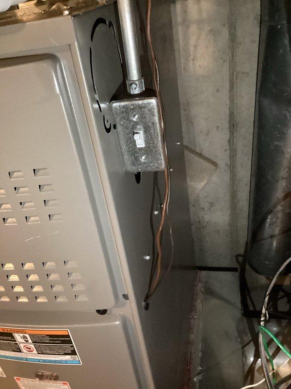 Completed full HVAC system replacement including installation of Lennox ML180UH070E36BK 80% efficiency furnace, ML13KC1-036 3-ton air conditioner, and CK40CT-30/36B-71 evaporator coil. Utilized existing equipment base and flushed existing lineset for reuse. Installed new 20x25x5 filter cabinet beneath furnace with MERV 11 filter. Modified return air system by removing existing 14x14 ceiling grille and cutting drywall to expand return air opening for improved airflow. Installed T6 programmable thermostat for system control. Completed all necessary ductwork connections including flexible and rigid metallic duct installation with proper sealing. Ran copper refrigerant lines and installed PVC condensate drain line with appropriate fittings and shutoff valve. Mounted electrical junction box with conduit for proper power supply to equipment. Installed double-wall venting for furnace exhaust per code requirements. Vacuumed all work areas and removed debris from installation. System tested and