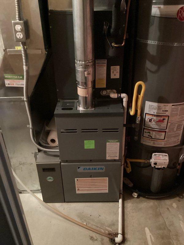 Completed annual Green Shield cooling maintenance on 6-year-old HVAC system with Daikin furnace located in basement. Performed comprehensive inspection of cooling system components, verified proper operation of all equipment, and confirmed no issues reported by customer. System found to be operating within normal parameters with all safety controls functioning correctly.