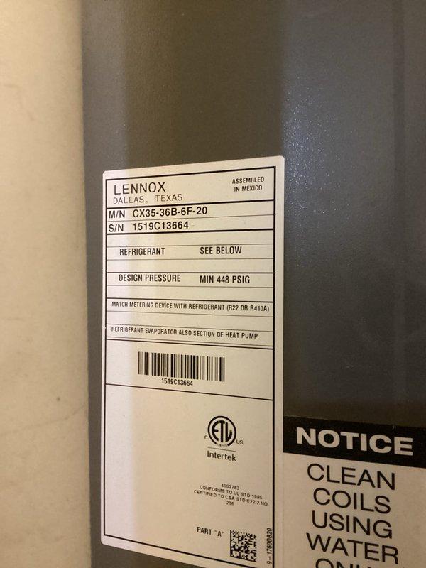 Responded to no-cooling complaint on six-year-old Lennox heat pump system, model CX35-36B-6F. Upon arrival, found outdoor condenser unit surrounded by significant debris accumulation including leaves, twigs, and organic material on concrete pad and gravel base. Inspected unit and identified restricted airflow due to debris blockage around condenser coil louvers. Cleared all debris from around unit perimeter and concrete pad to restore proper ventilation. Verified fan operation and checked refrigerant evaporator section per manufacturer specifications. Unit operational at time of departure with improved airflow to condenser.