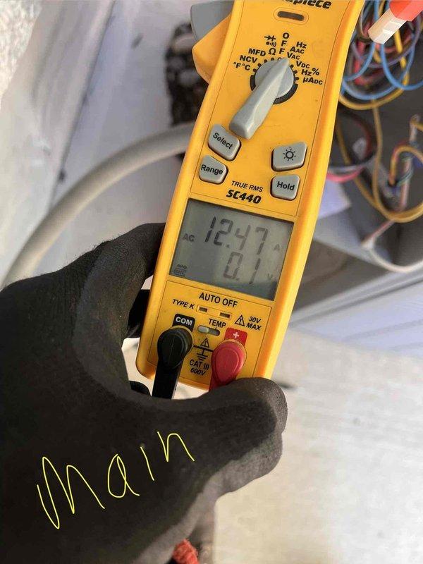 Performed routine maintenance on two residential cooling systems, both 6-9 years old. Conducted electrical diagnostics using digital multimeter to verify proper voltage and capacitance readings on both units. Inspected condenser coils and identified moderate debris accumulation between fins. Cleaned condenser coils to restore optimal heat transfer efficiency and airflow. Verified all electrical connections and system operations on both HVAC units to ensure proper cooling performance for the season.