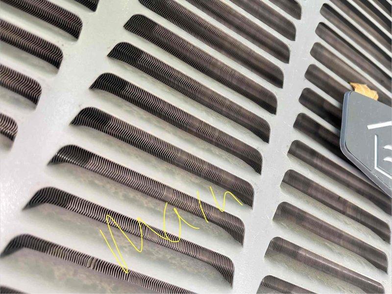 Performed routine maintenance on two residential cooling systems, both 6-9 years old. Conducted electrical diagnostics using digital multimeter to verify proper voltage and capacitance readings on both units. Inspected condenser coils and identified moderate debris accumulation between fins. Cleaned condenser coils to restore optimal heat transfer efficiency and airflow. Verified all electrical connections and system operations on both HVAC units to ensure proper cooling performance for the season.