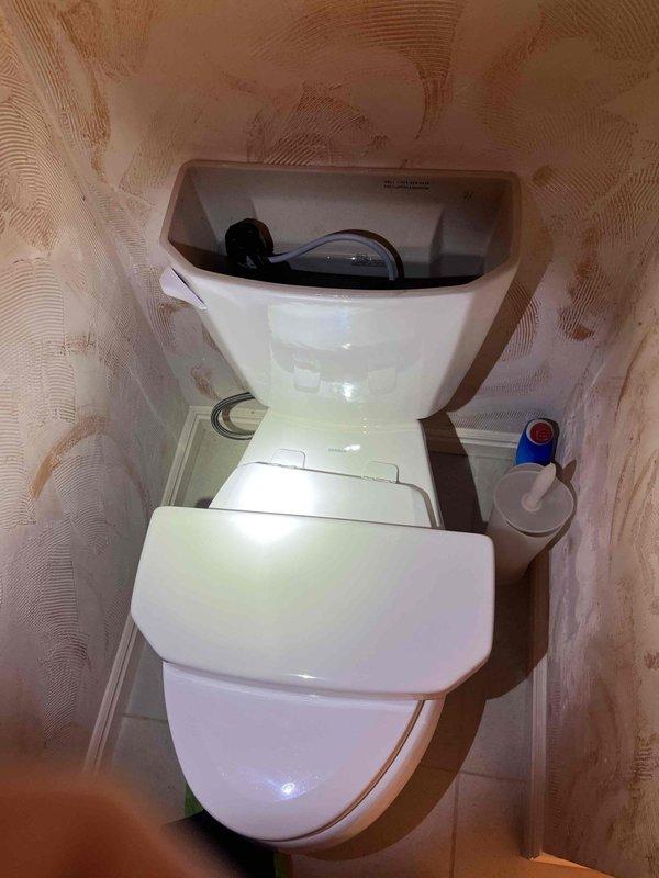 Responded to a residential toilet fixture experiencing intermittent refill cycles every five to fifteen minutes, causing continuous water loss in the tank. Diagnosed faulty flapper valve assembly allowing water to leak from tank into bowl, triggering the fill valve to activate repeatedly. Replaced defective flapper with new component, tested flush mechanism for proper sealing, and verified fill valve operation to ensure complete resolution of the running water issue.