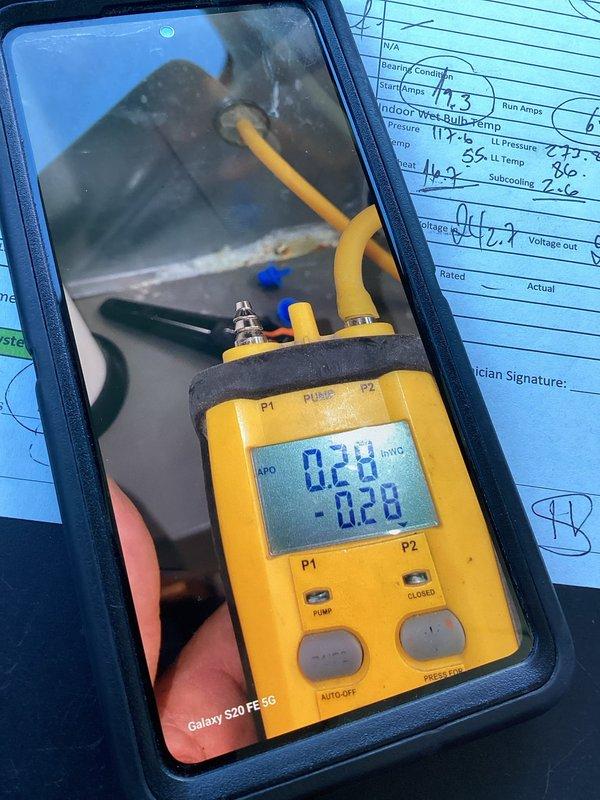 Responded to reported A/C unit intermittently cycling with buzzing noises and excessive heat buildup on 2009 system with outdoor condenser and basement furnace. Performed comprehensive Cool 10+ preventive maintenance inspection including refrigerant pressure diagnostics using digital manifold gauge set, recording superheat and subcooling measurements to verify proper system charge levels. Documented temperature differentials, operating pressures, and electrical parameters to assess overall system performance and identify potential failure points causing the reported symptoms.