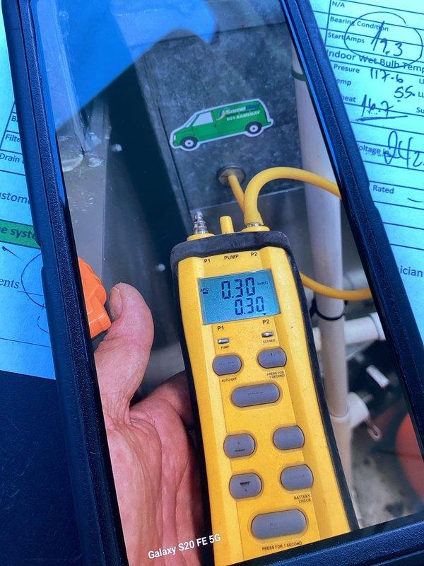 Responded to reported A/C unit intermittently cycling with buzzing noises and excessive heat buildup on 2009 system with outdoor condenser and basement furnace. Performed comprehensive Cool 10+ preventive maintenance inspection including refrigerant pressure diagnostics using digital manifold gauge set, recording superheat and subcooling measurements to verify proper system charge levels. Documented temperature differentials, operating pressures, and electrical parameters to assess overall system performance and identify potential failure points causing the reported symptoms.
