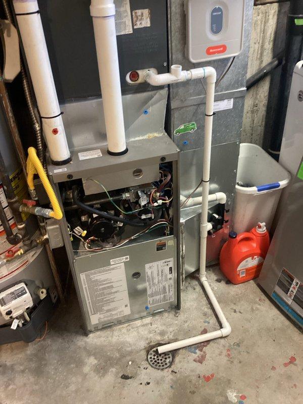 Responded to reported AC unit short cycling with buzzing noises and overheating. Upon inspection of 2009 AC system with 2007 evaporator coil, diagnosed multiple critical issues including failed capacitor (replaced on-site), elevated static pressure, system freezing, rusted evaporator coil, low refrigerant charge, and high amperage draw. Provided technical lead estimate for complete system evaluation and repair options ranging from coil replacement to full system upgrade given age and condition of equipment.