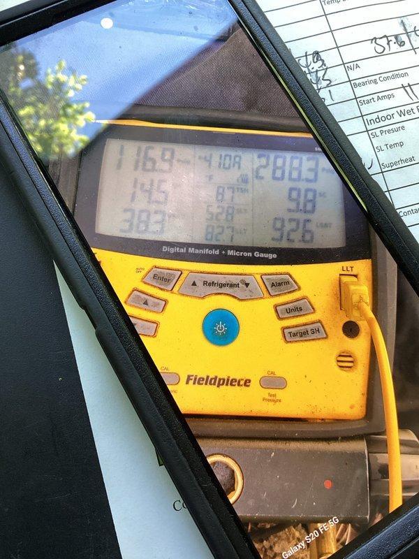 Completed routine Green Shield cooling maintenance on 10-year-old HVAC system with units in garage and backyard. Performed comprehensive system diagnostics using digital manifold gauge to verify refrigerant pressures, temperatures, and superheat levels, with all readings within normal operating parameters. Tested run capacitor with clamp meter, confirming proper microfarad rating and amperage draw. No issues reported by member and no deficiencies found during inspection.