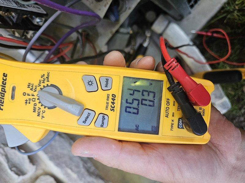 Performed safety operations and maintenance check on residential cooling system aged 6-9 years. Confirmed equipment locations in ground-level backyard and attic areas. Discussed homeowner concerns regarding airflow distribution and temperature consistency between floors. Conducted thorough inspection of AC unit, measuring electrical parameters including voltage readings of 61.7V and amperage draw of 0.53A using calibrated testing equipment. Evaluated system performance, operational safety, and identified any maintenance needs. Provided homeowner with findings and recommendations for optimal system operation and efficiency.